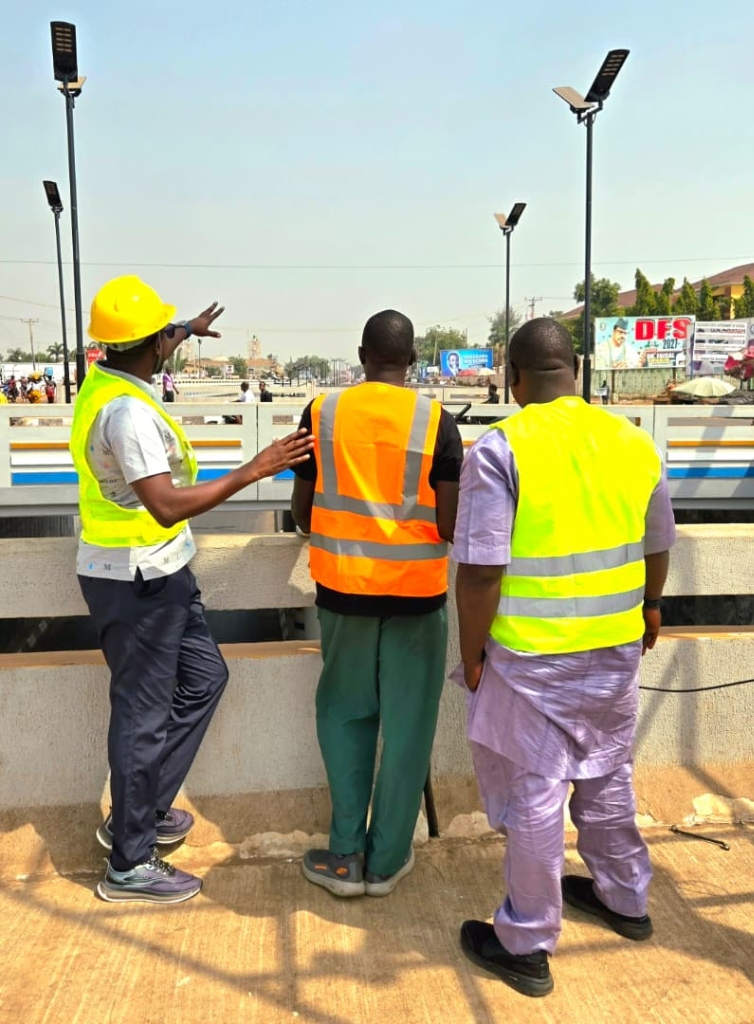 A A Nafada Solutions project engineers supervising municipal solar street lighting and renewable energy infrastructure